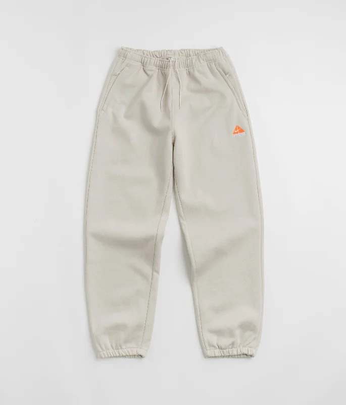 Pants-Camo-Nike ACG Tuff Fleece Lungs Pants - Light Orewood Brown / Hyper Crimson